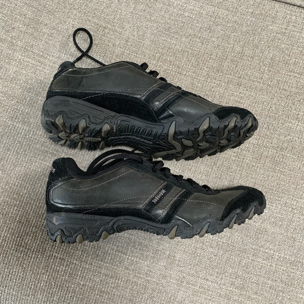 Black Skechers sneakers